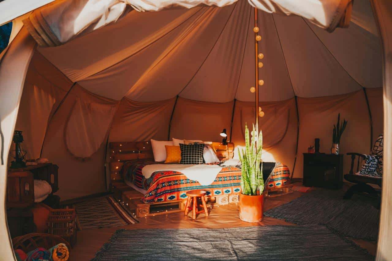luxury camping glamping tent setup interior