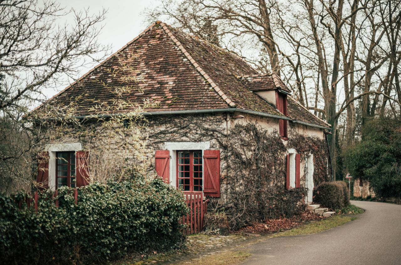 rustic french cottage with shutters countryside