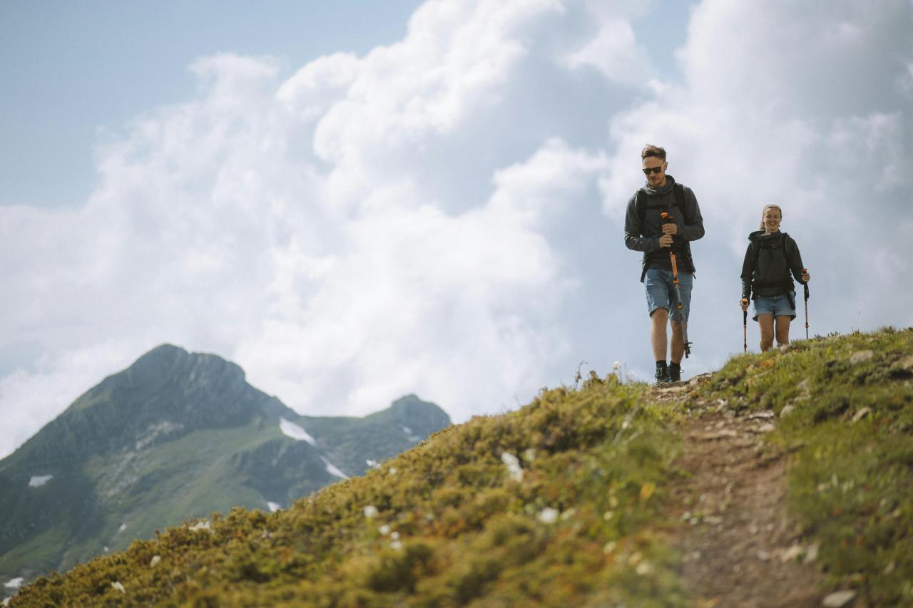 couple hiking mountain landscape