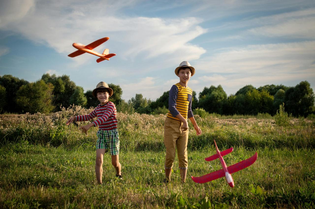 happy family children playing outdoors countryside